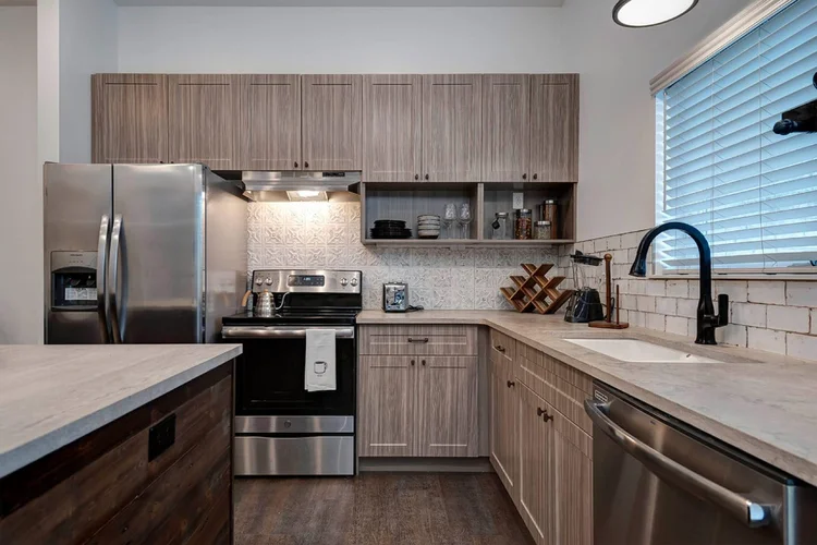 Quarry Town Apartments Springfield MO kitchen by CBS Cabinets