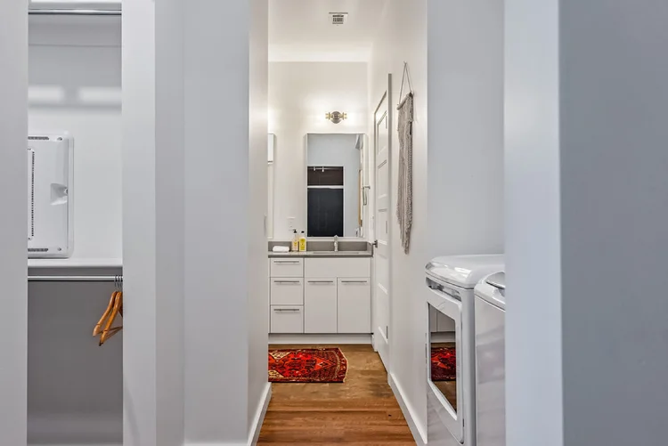 Multifamily bathroom vanity installation by CBS Cabinets Southwest Missouri builder partner